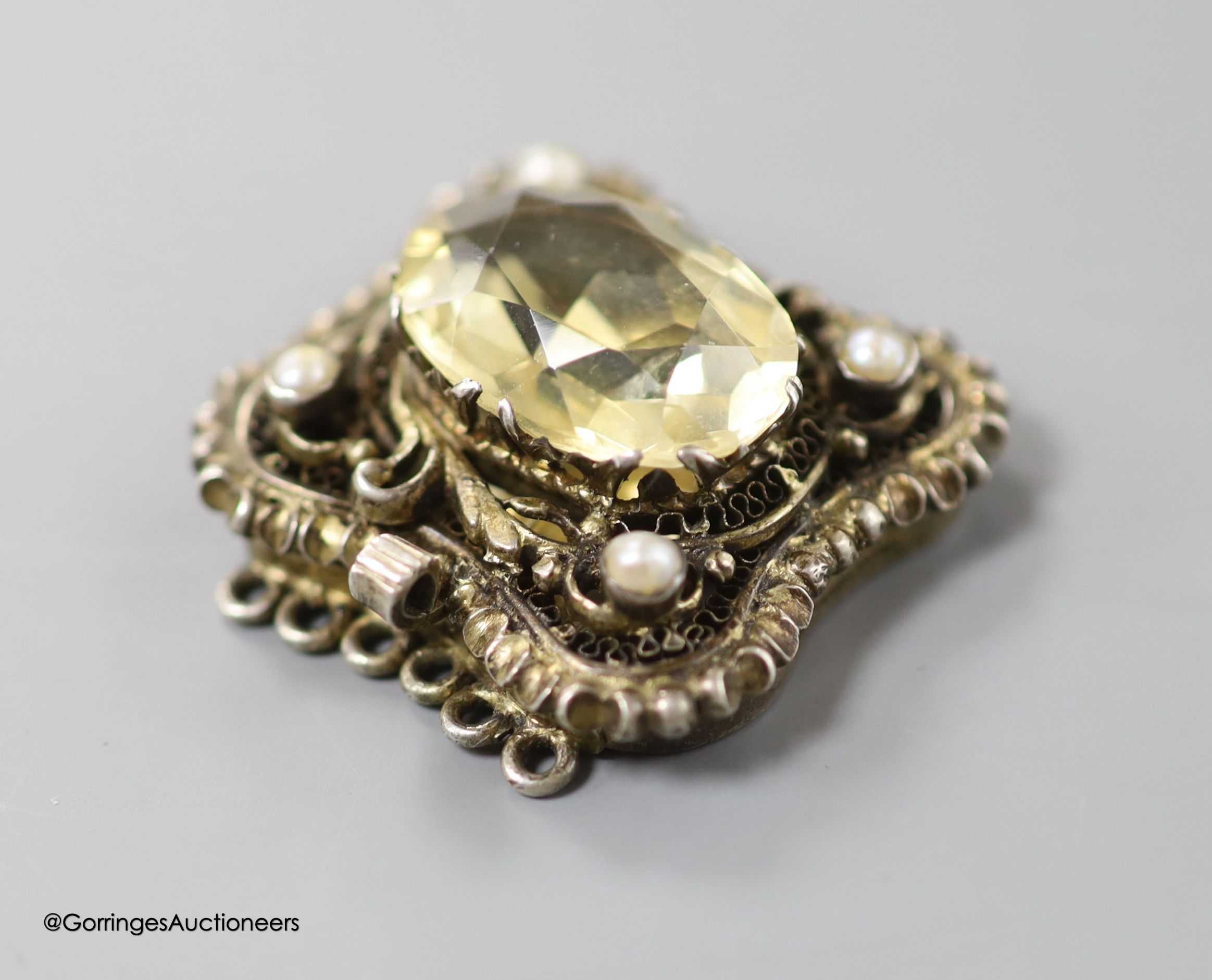 A Victorian yellow metal mounted glazed oval pendant, with miniature portrait of a young lady and plaited hair verso, 40mm, gross weight 18.1 grams, a yellow metal and tooth mounted stick pin and a gem set white metal cl